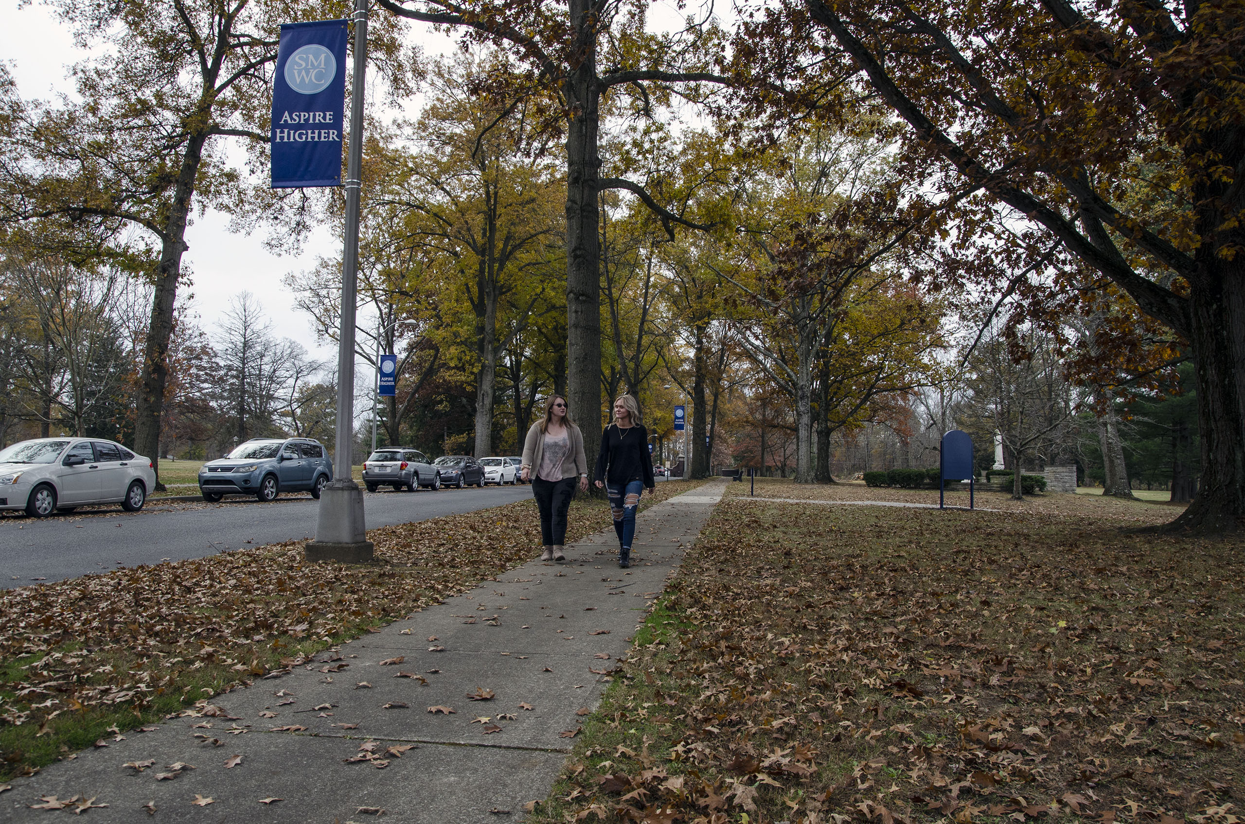 Two students walking down the Avenue