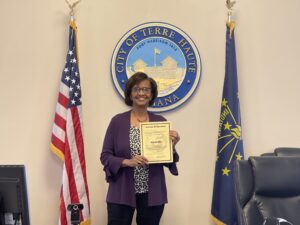 Reed holding the appointment certificate