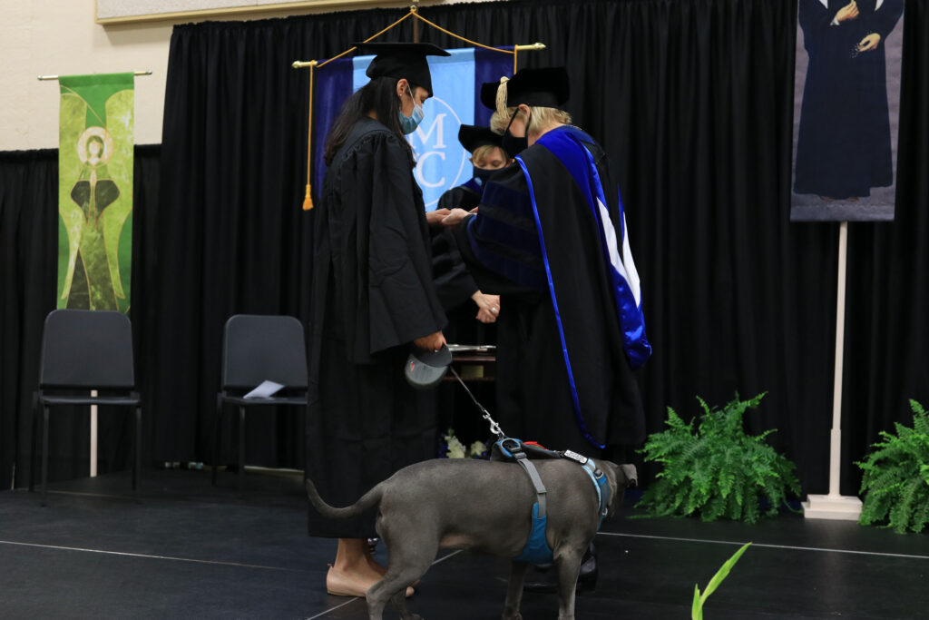 Guzman receiving her ring.