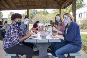 Students helping create pottery for Foundation Day