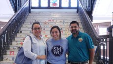 Family stands a student at move-in day