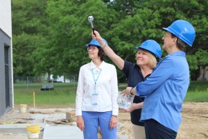 Carmen Piasecki ’70, Dottie L. King, Ph.D., president of SMWC and Dawn Tomaszewski ’74, general superior of the Sisters of Providence bless the new dining hall, which will be named after Sister Barbara Doherty.