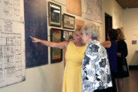 Dottie King pointing to blue print