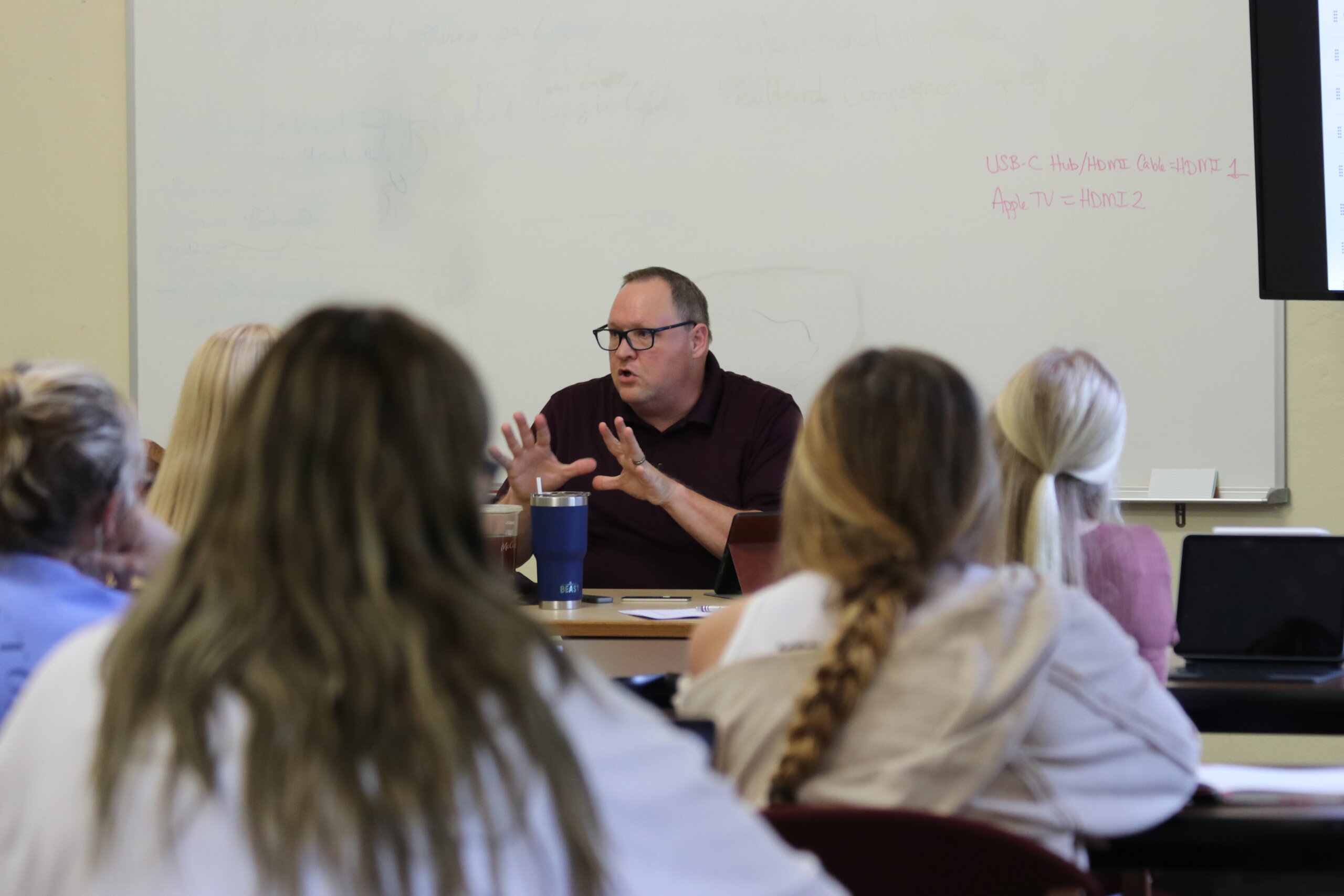 teacher at front of classroom