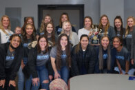 Women's volleyball team with Mayor Duke Bennett