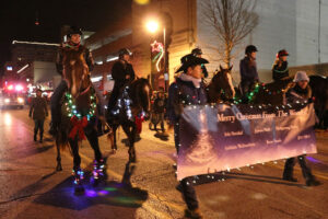 SMWC marches in the 2016 Christmas Parade