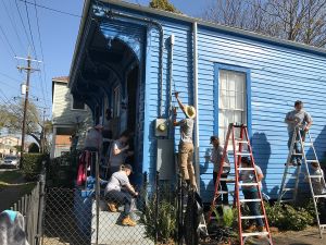 SMWC students painting a house in New Orleans