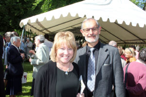 President King standing with Patrice Chauvel