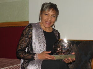 Debra Powell receiving award