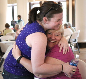 Alums hugging