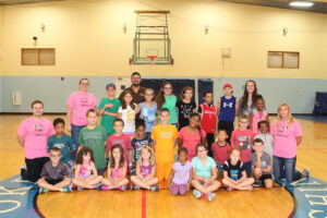Brandon Halleck with campers at Booker T. Washington Community Center