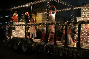 Dance students on Christmas parade float
