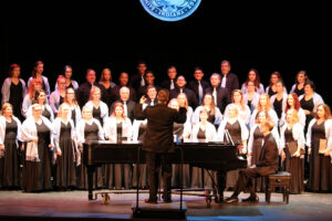 The SMWC Chorale singing in the Cecilian Auditorium