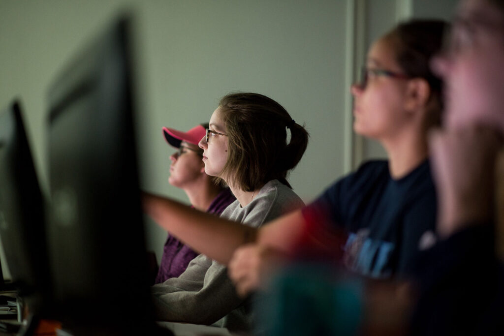 Business students sitting in computer lab