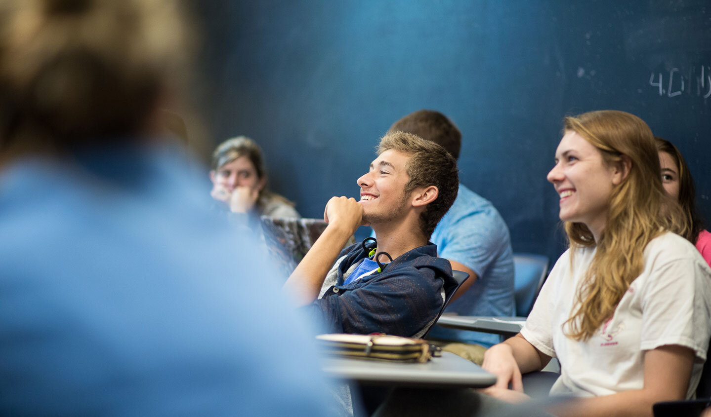 Student in English class smiling