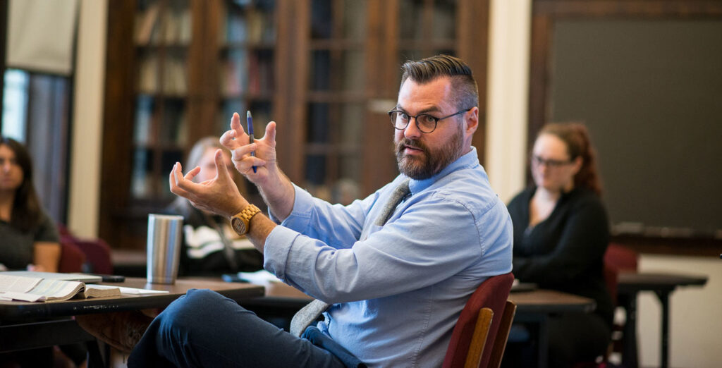 Professor Bill Riley teaching writing class