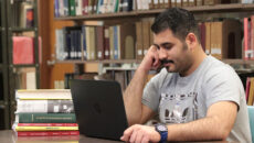 Saudi student studying in the library
