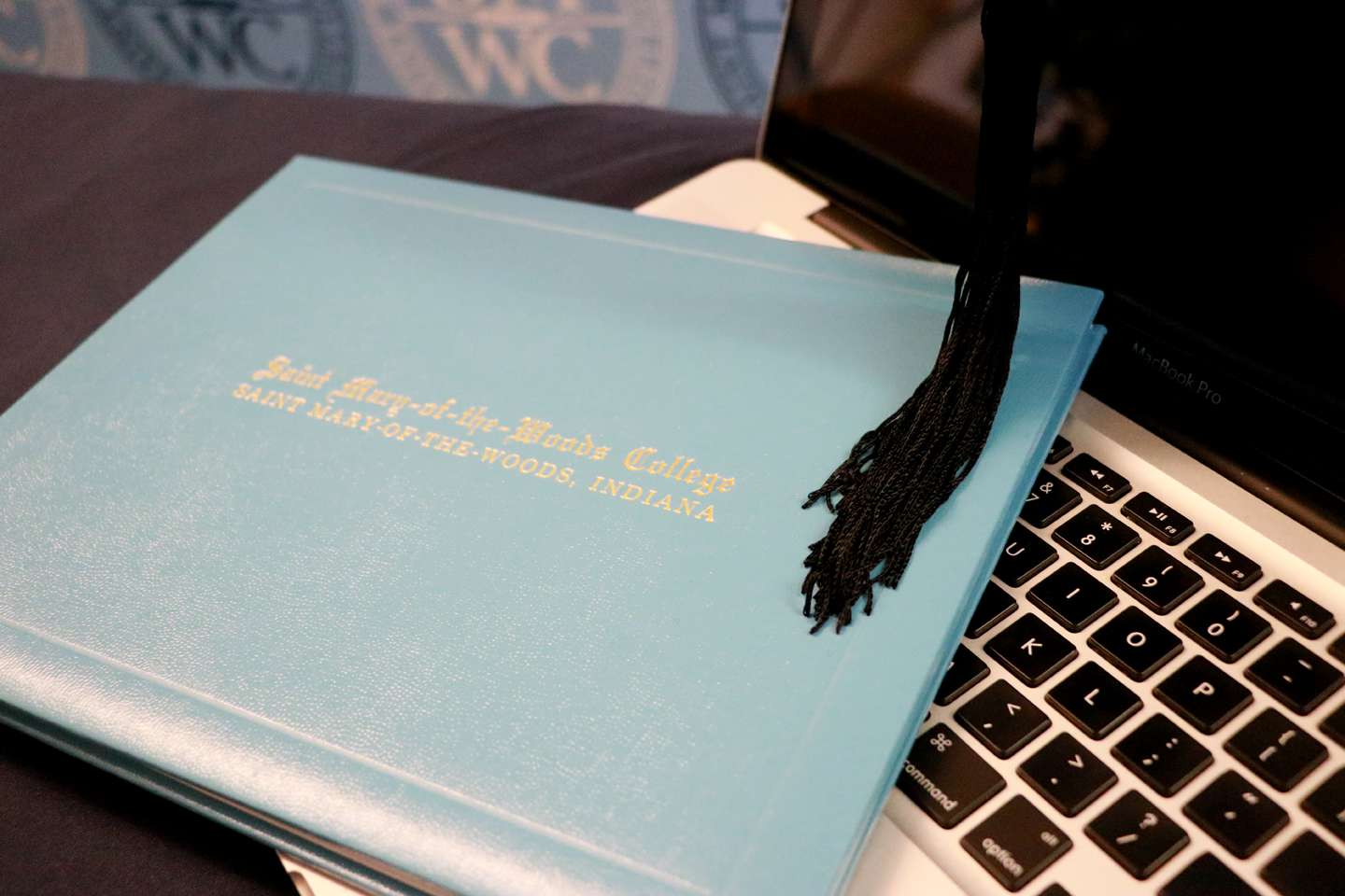 SMWC diploma, cap and keyboard